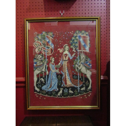 4064 - A tapestry of ladies flanked by a lion and unicorn bearing flags.  Framed and glazed.  50 x 40cm ima... 