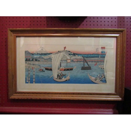 4065 - A Japanese woodblock print of ships in harbour.  Framed and glazed.  20 x 42cm image size   (R) £60