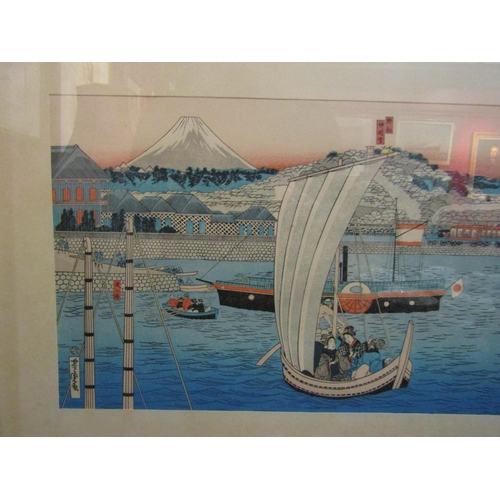 4065 - A Japanese woodblock print of ships in harbour.  Framed and glazed.  20 x 42cm image size   (R) £60