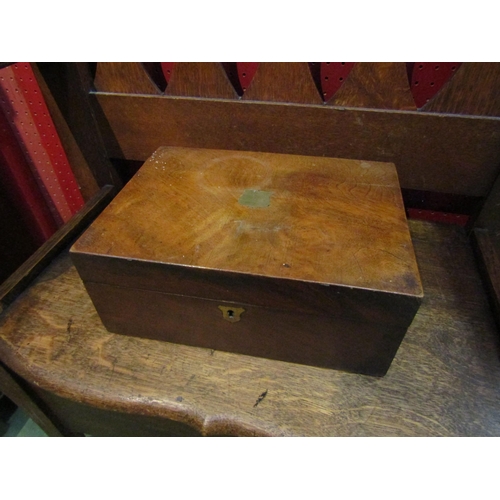 4100 - A Victorian mahogany writing box, shield cartouche to lid, together with an oversized hardwood Afric... 