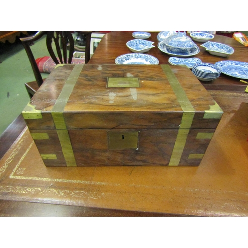 4107 - A late 19th Century walnut writing box with brass plaque and banding, inkwells and keys