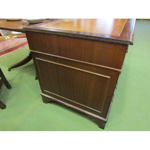 4108 - A leather topped twin pedestal eight drawer desk, 76cm tall x 134cm wide x 68cm deep