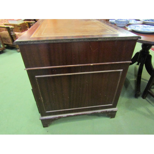 4108 - A leather topped twin pedestal eight drawer desk, 76cm tall x 134cm wide x 68cm deep