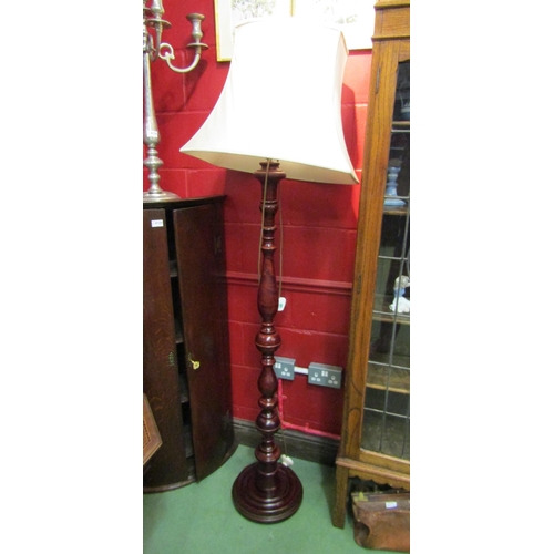 4127 - A turned column standard lamp on a circular base (with shade)   (R) £35