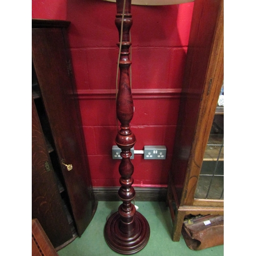 4127 - A turned column standard lamp on a circular base (with shade)   (R) £35