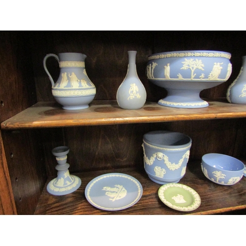 4129 - A selection of Wedgwood Jasperware items including jardiniere, bowl, candlesticks, jug etc. (11)