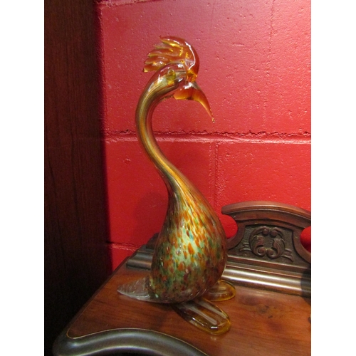 4135 - A 1950's Murano glass figure of a bird with gold foil and multi-coloured inclusions.  34.5cm high