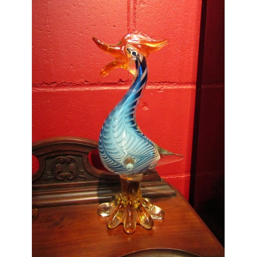 4136 - A 1950's Murano glass figure of a bird in blue, white, clear and amber colours.  30cm high