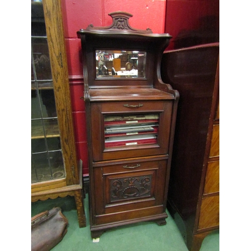 4137 - An Edwardian mahogany music cabinet with contents, mirror to top, 128cm tall x 46cm wide x 37cm deep