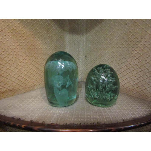 4151 - Two Victorian dump glass paperweights