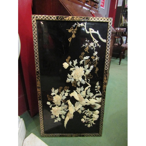 4165 - An Oriental lacquered panel with high relief mother-of-pearl detail, 50cm x 90cm