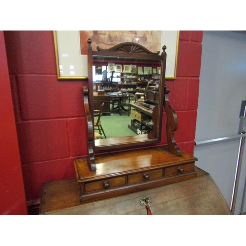 4167 - A Circa 1890 walnut dressing chest tilting mirror with carved decoration and finials over a three dr... 