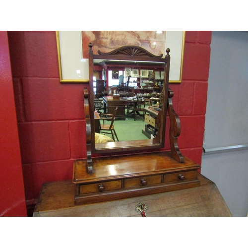 4167 - A Circa 1890 walnut dressing chest tilting mirror with carved decoration and finials over a three dr... 