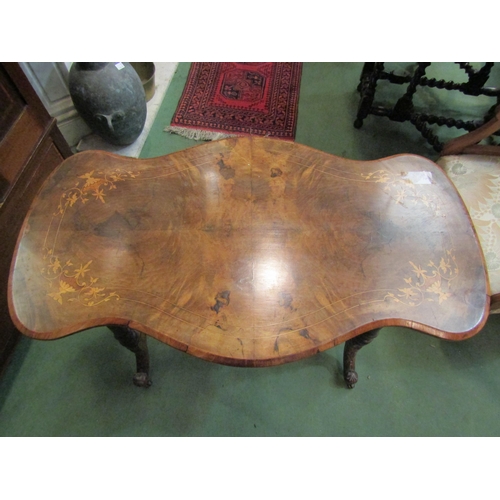 4183 - A Victorian walnut shaped top occasional table with marquetry satinwood inlay on a four column base ... 