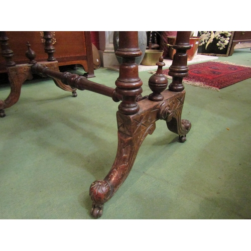 4183 - A Victorian walnut shaped top occasional table with marquetry satinwood inlay on a four column base ... 