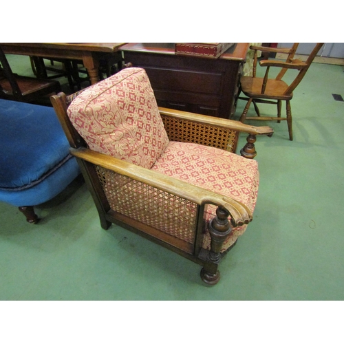 4188 - A 1930's bergere armchair with cushions