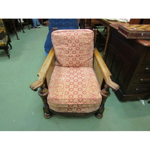 4188 - A 1930's bergere armchair with cushions