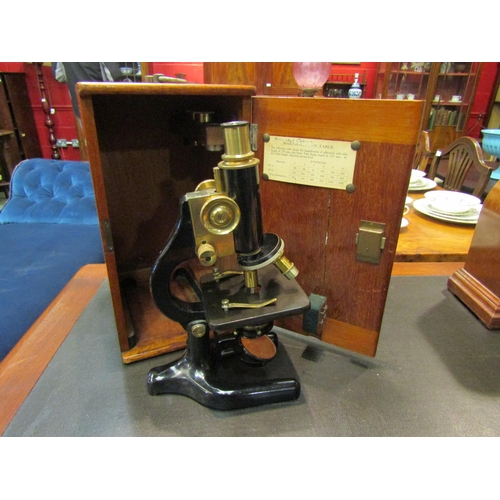 4189 - A  mahogany cased W R Prior & Co Eagle St, London W1 microscope, serial no 4927 together with an ext... 