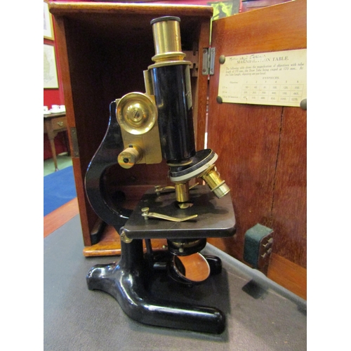 4189 - A  mahogany cased W R Prior & Co Eagle St, London W1 microscope, serial no 4927 together with an ext... 