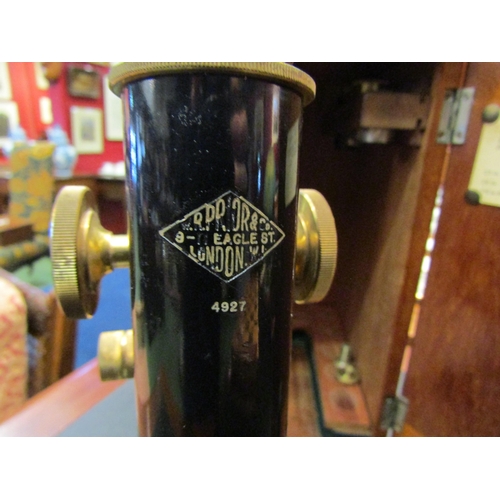 4189 - A  mahogany cased W R Prior & Co Eagle St, London W1 microscope, serial no 4927 together with an ext... 