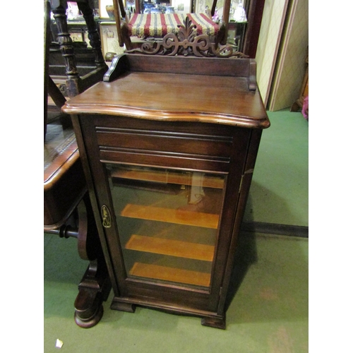 4203 - An Edwardian mahogany glazed front music cabinet, 107cm tall, 47cm wide, 42cm deep