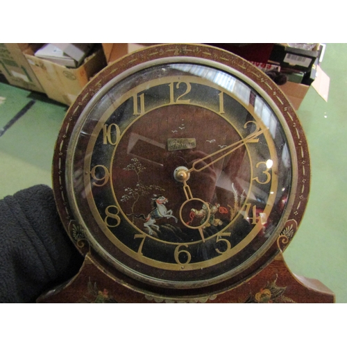 4205 - A Mid 20th Century Smiths chinoserie mantel clock, crack to face, 21cm tall