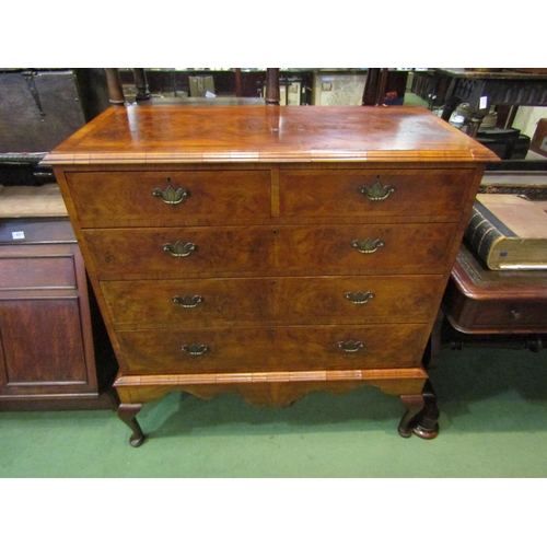 4210 - An 18th Century revival crossbanded figured walnut chest of stand, the two short and three graduatin... 