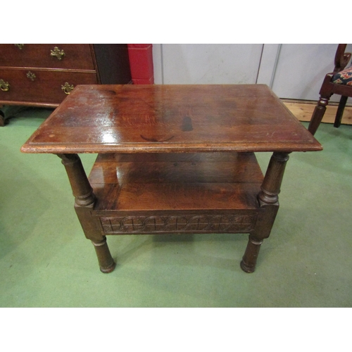 4229 - A Jacobean style oak coffee table, with under tier, carved frieze, 57cm tall, 66cm long, 42cm deep