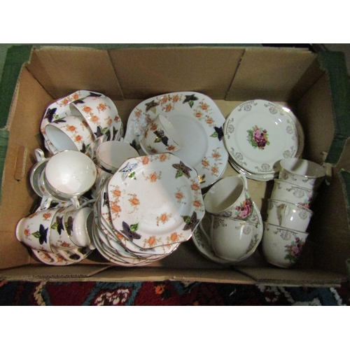 4242 - A box of teaware to includes Imari style bone china and Barratts Staffordshire example