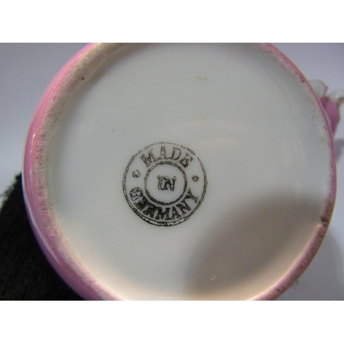 4258 - Seven pieces of early 20th Century pink lustre tourest ware including Bradford, Bridlington, Harwich... 