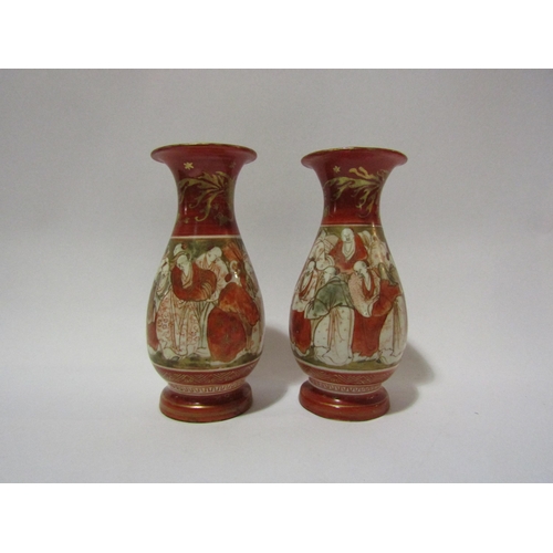 4284 - A pair of Oriental baluster form vases in the Satsuma style, 17cm tall