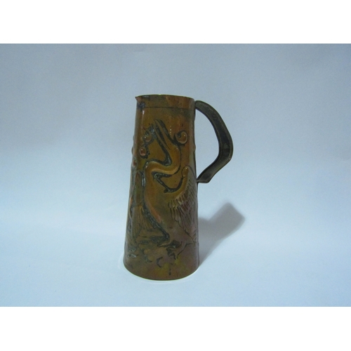 4297 - A Arts and Crafts Newlyn style copper jug with embossed bird design, 19.5cm tall