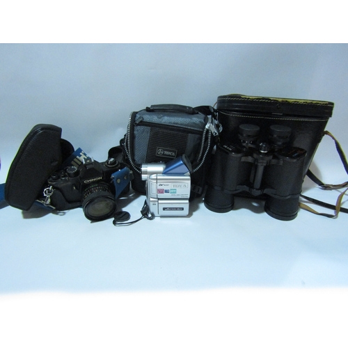 4309 - A Chinon CM-3 SLR camera Cosmica 10x50 binoculars and Teica DV1000 camcorder