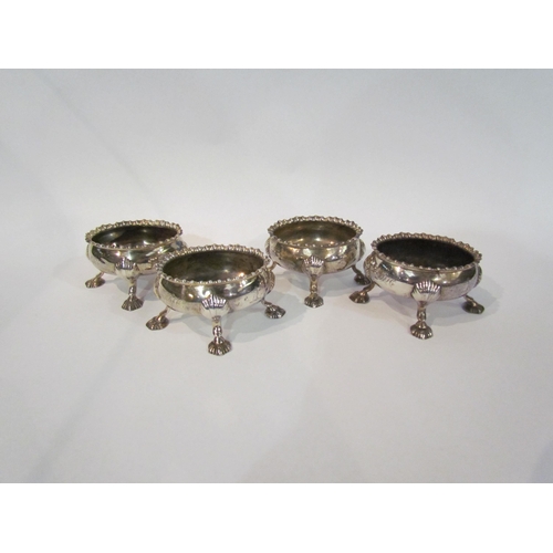 4328 - A set of four oval silver salts gadrooned edge, (no liners) raised on four outswept feet, hallmarks ... 