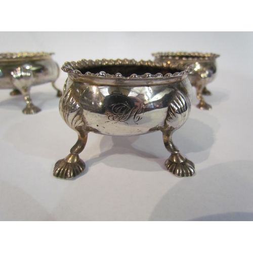 4328 - A set of four oval silver salts gadrooned edge, (no liners) raised on four outswept feet, hallmarks ... 