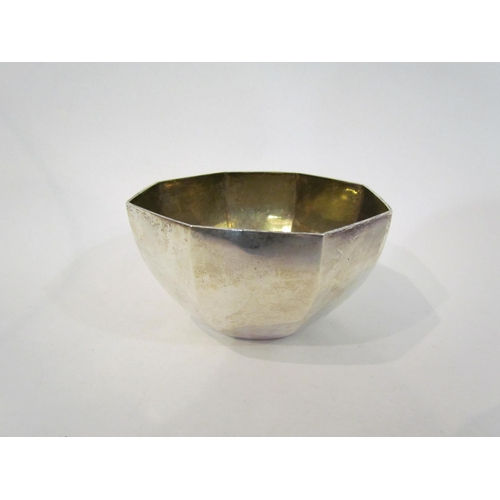 4361 - A silver Thomas, New Bond Street panel form bowl gilding to interior rubbed, London (dented) 12cm di... 