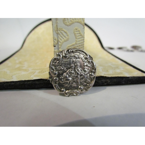 4381 - A set of six silver buttons decorated with couple in garden scene