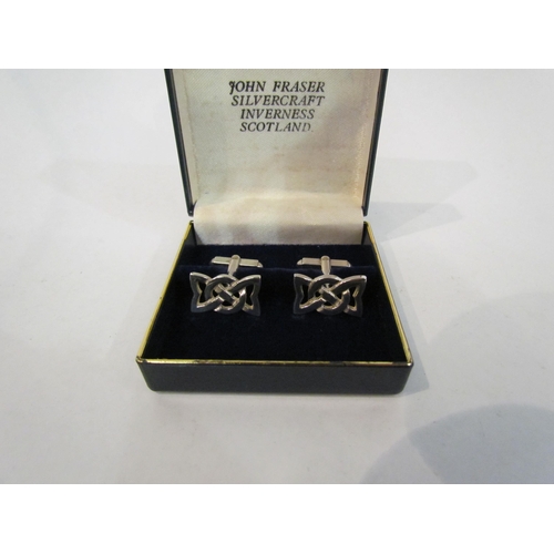 4388 - A cased pair of John Fraser silvercraft Scottish silver cufflinks