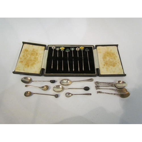 4391 - A set of eight silver cocktail sticks, with guilloche terminals depicting English, Irish, Scottish a... 