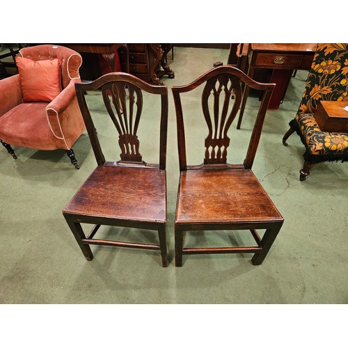 4180 - A harlequin set of six Georgian solid-seat dining chairs