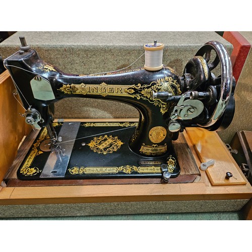 4202 - A singer hand crank sewing machine together with a Commodore electric exmple, both cased