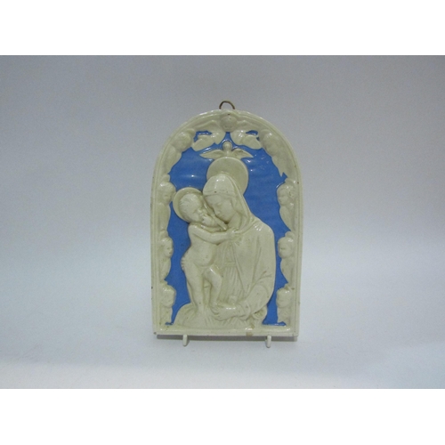 4412 - Two ceramic ecclesiastical wall hanging plaques one depicting Mary & baby Jesus, 23.5cm tall and 17.... 