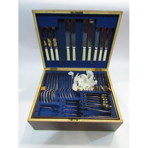 4440 - A near complete canteen of cutlery contained in an oak case