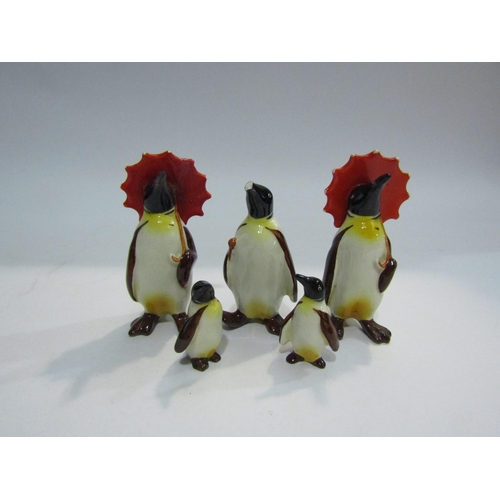 4452 - Beswick penguins, two with parasols, varying sizes, four a/f (5)