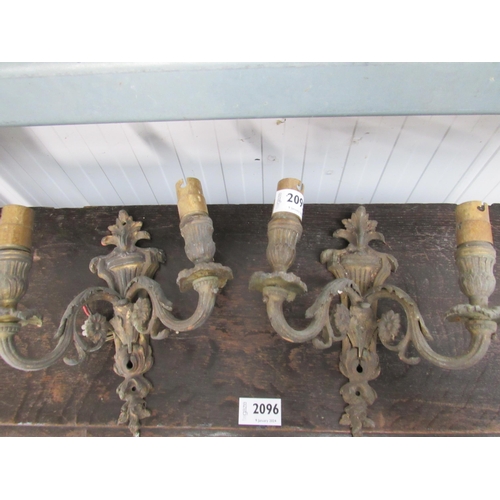 2107 - A pair of Regency style brass twin arm wall lights