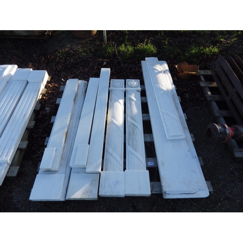 7005 - A decorative white marble fire surround