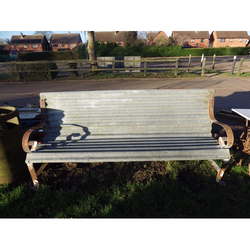 7027 - A 7ft metal and corrugated garden bench  (R)  £30