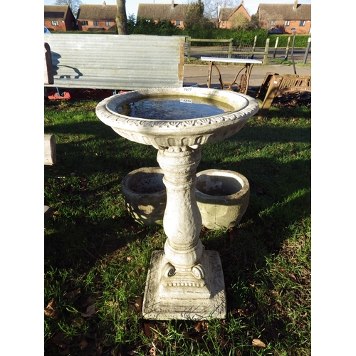 7077 - A composition bird bath, Roman column plinth, 28