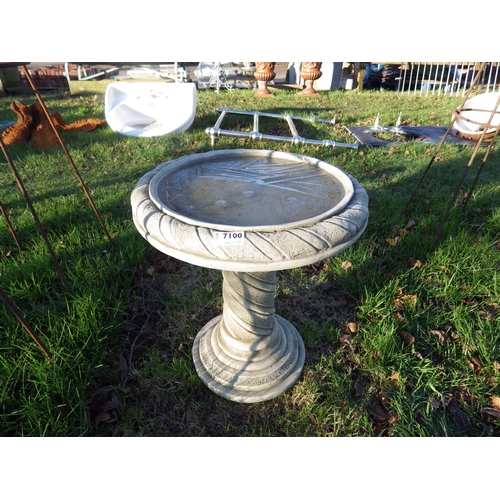 7100 - A squat composition twisted birdbath, 17