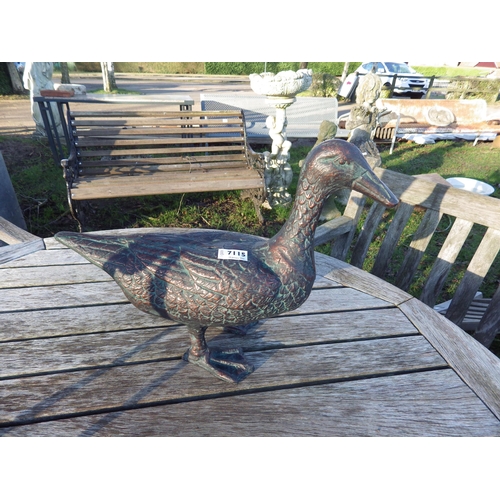 7115 - A bronzed figure of a duck, 13